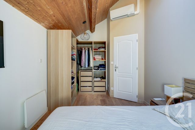 Afficher la photo en grand Appartement F3 bis à vendre - 3 pièces - 64.61 m2 - BELIGNEUX - 01 - RHONE-ALPES - Century 21 Rive Gauche