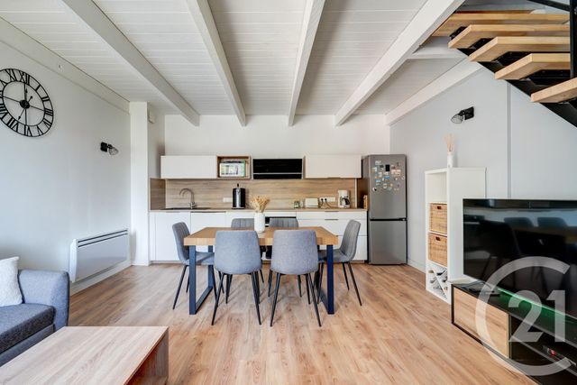 Afficher la photo en grand Appartement F3 bis à vendre - 3 pièces - 64.61 m2 - BELIGNEUX - 01 - RHONE-ALPES - Century 21 Rive Gauche